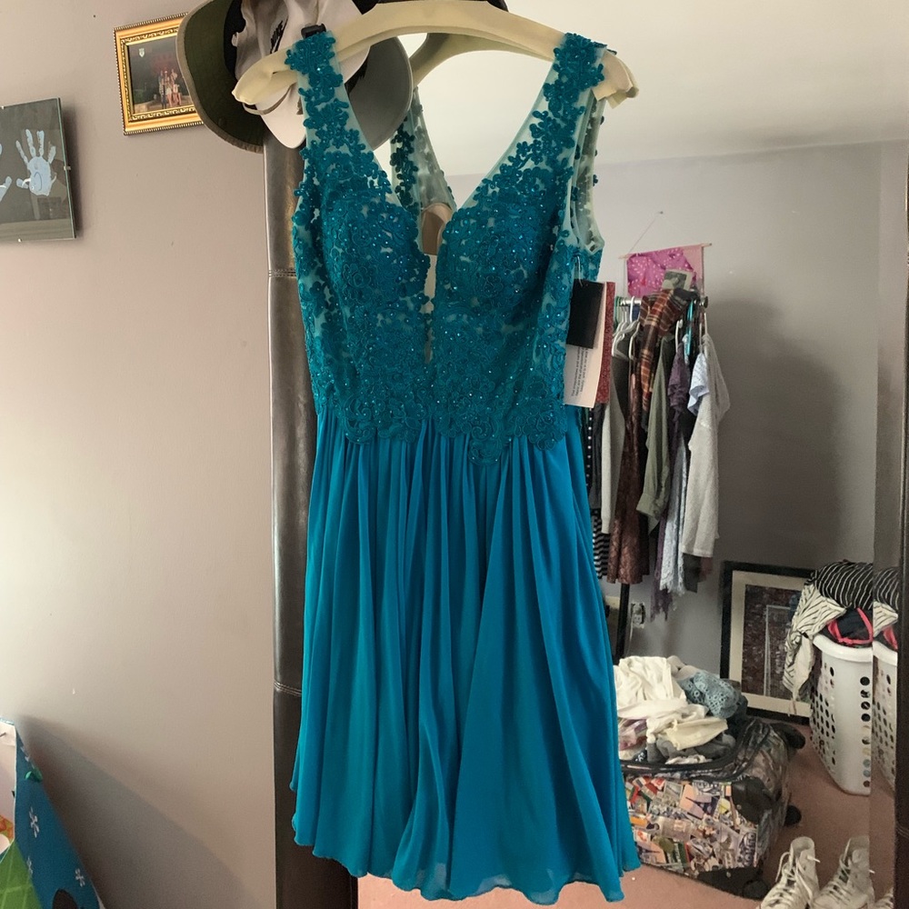 Blue dress bought at designer dress store!